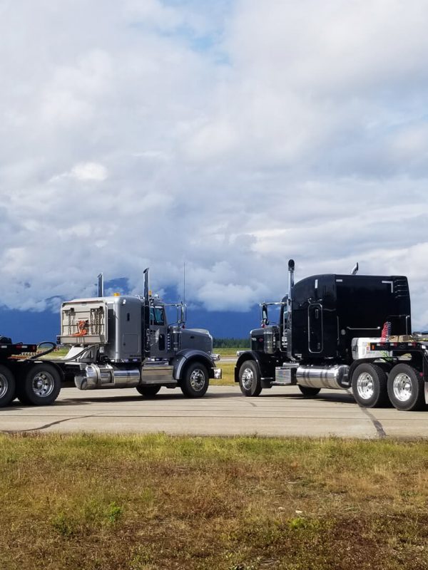 Steelhead Transport hauling Monster Trucks