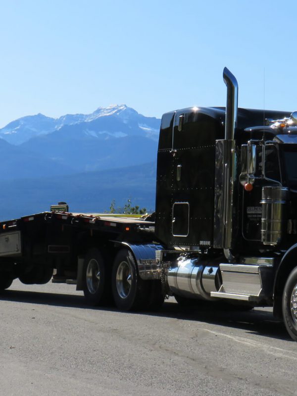 Steelhead Transport hauling pick up truck